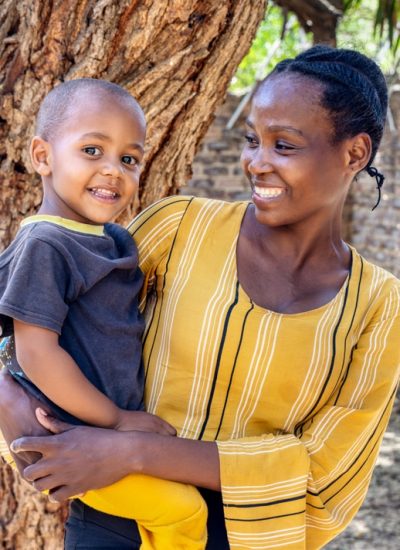 African,Mother,With,Her,Child,Holding,It,In,Her,Arms